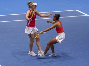 Doubles star Gabriela Dabrowski made history on more than one occasion this season to cement her place in the Canadian tennis record books.&ampnbsp;Dabrowski, left, and Leylah Fernandez celebrate after defeating Czech Republic's Barbora Krejcikova and Katerina Siniakova during the semifinal doubles tennis match at the Billie Jean King Cup finals at La Cartuja stadium in Seville, southern Spain, Saturday, Nov. 11, 2023.