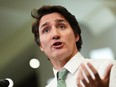 Prime Minister Justin Trudeau makes an announcement that the government will double the carbon price rebate for rural Canadians beginning next April during a news conference in Ottawa on Thursday Oct. 26, 2023.