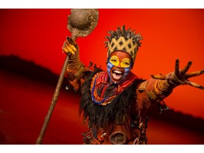 A character from Disney's The Lion King musical in costume
