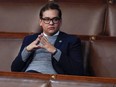 Rep. George Santos, R-N.Y., waits for the start of a session in the House chamber as the House meets for the fourth day to elect a speaker and convene the 118th Congress in Washington, Jan. 6, 2023.