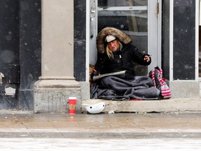 Homeless woman in winter storm
