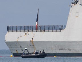 French marines patrol the area around the French navy ship, the FS Languedoc (D653), as seen in port on Jan. 20, 2024 in Djibouti, Djibouti. Attacks on commercial ships by Yemen's Houthi rebel group, who say they are acting in protest of Israel's war in Gaza, have imperilled a vital global shipping route through the Bab-el-Mandeb strait that lies between Yemen and Djibouti and connects the Gulf of Aden and Red Sea. The disruption has forced more shipping companies to divert around the Horn of Africa, upending supply chains and increasing costs.