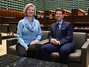 Heather Lank, parliamentary librarian (left) and Liam Meagher, manager of current awareness, at the Library of Parliament. SUPPLIED