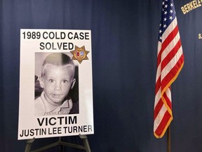 An image of victim Justin Lee Turner is displayed during a news conference Jan. 10.