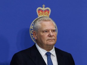 Doug Ford attends a press conference at the York Regional Police Headquarters in Aurora, Ont., Wednesday, Jan. 31, 2024.