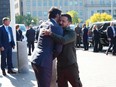 Prime Minister Justin Trudeau hugs Ukrainian President Volodymyr Zelenskyy