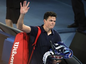 Milos Raonic of Canada waves as he leaves Rod Laver Arena after retiring from his first round match against Alex de Minaur of Australia at the Australian Open tennis championships at Melbourne Park, Melbourne, Australia, Monday, Jan. 15, 2024. Raonic will replace Denis Shapovalov on the Canadian roster for next week's Davis Cup qualifier tie against South Korea at IGA Stadium.THE CANADIAN PRESS/AP-Asanka Brendon Ratnayake