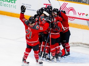 Ottawa players celebrate a 3-1 victory over Toronto following the third period at TD Place Arena on Tuesday, Jan. 23, 2024.