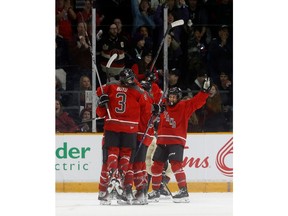 Ottawa celebrates their first goal ever Tuesday night second first period action against Montreal. TONY CALDWELL, Postmedia.