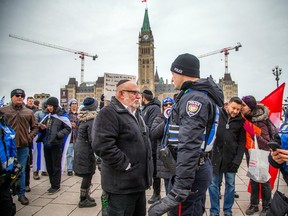 A group from the Jewish community gathered on Parliament Hill and marched to the Embassy of Qatar on Metcalfe Street, Sunday, Feb. 4, 2024.