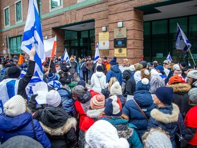 A group from the Jewish community gathered on Parliament Hill and marched to the Embassy of Qatar on Metcalfe Street, Sunday, Feb. 4, 2024.
