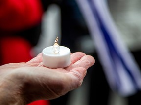 A group from the Jewish community gathered on Parliament Hill and marched to the Embassy of Qatar on Metcalfe Street, Sunday, Feb. 4, 2024.