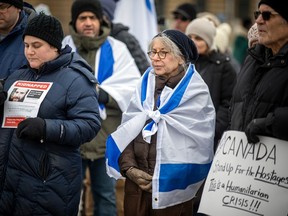 A group from the Jewish community gathered on Parliament Hill and marched to the Embassy of Qatar on Metcalfe Street, Sunday, Feb. 4, 2024.