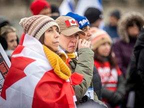 A group from the Jewish community gathered on Parliament Hill and marched to the Embassy of Qatar on Metcalfe Street, Sunday, Feb. 4, 2024.