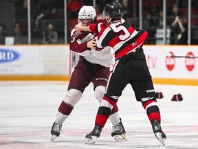 Bradley Horner of the Ottawa 67’s fights with Cam Gauvreau of the Peteborough Petes during a game at TD Place on February 9, 2024 in Ottawa.