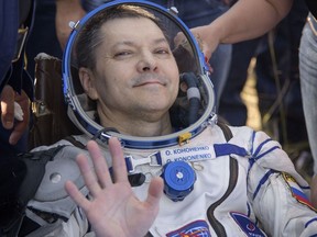 Oleg Kononenko is seen outside the Soyuz MS-11 spacecraft after he, NASA astronaut Anne McClain, and Canadian Space Agency astronaut David Saint-Jacques landed in Kazakhstan in June 2019 after 204 days on the International Space Station.