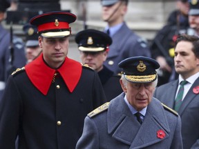 FILE - Britain's King Charles III, right, and Prince William attend the annual Remembrance Sunday ceremony at the Cenotaph in London, Sunday, Nov. 12, 2023. King Charles III has been diagnosed with a form of cancer and has begun treatment, Buckingham Palace says on Monday, Feb. 5, 2024.