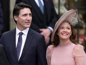 Prime Minister Justin Trudeau and Sophie Trudeau arrive at Westminster Abbey prior to the coronation of King Charles III on May 6, 2023.