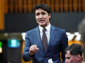 FILE: Prime Minister Justin Trudeau rises during question period in the House of Commons on Parliament Hill in Ottawa on Wednesday, Feb. 7, 2024.