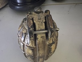 A decommissioned grenade is shown in this photo from Abbotsford Police, who say it was found in a thrift store donation bin on Monday.