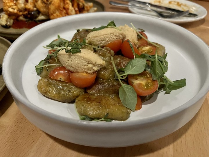  Gnocchi with vegan sausage, almond ricotta and cherry tomatoes at St. Elsewhere on Somerset Street West