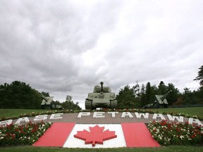 Clouds loom over the main gate at Canadian Forces Base Petawawa, Ont. Monday, Sept. 4, 2006.