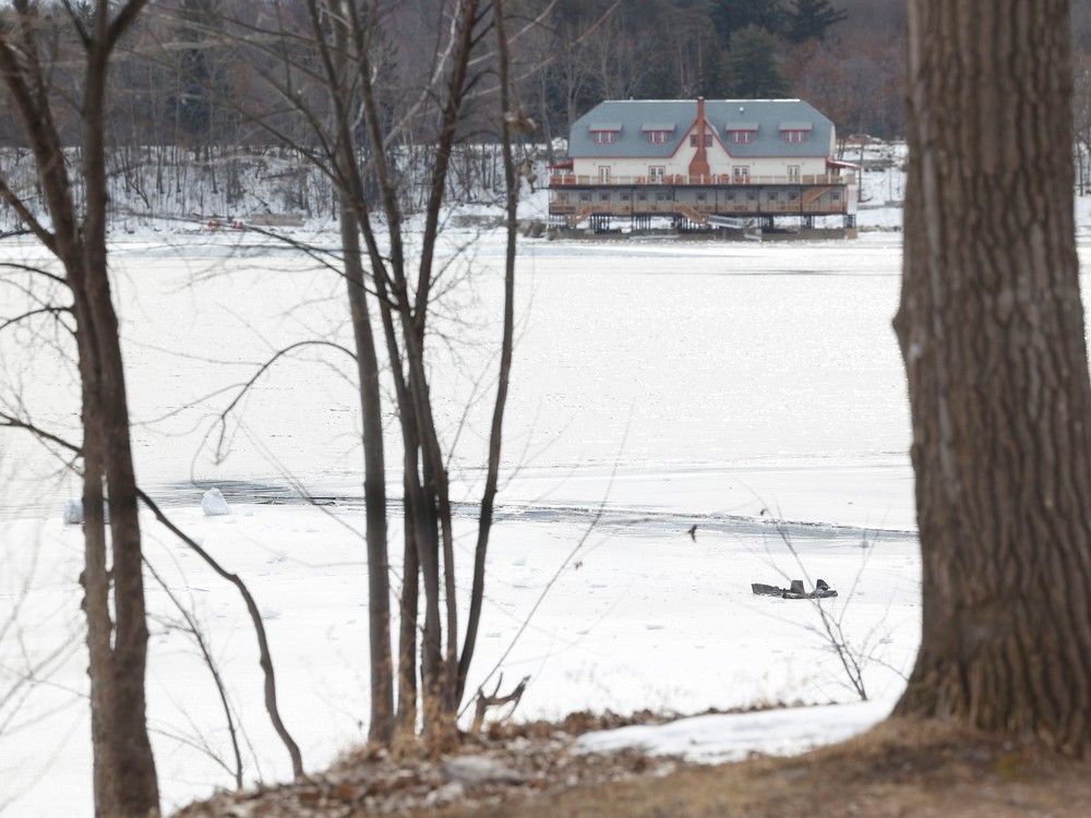 A path of broken ice shows where a car went into the Ottawa River on Thursday off Rue Jacques Cartier street between Saint-Louis and Prince-Albert streets in Gatineau. 