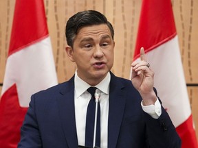 Conservative Leader Pierre Poilievre address the national Conservative caucus on Parliament Hill in Ottawa on Jan. 28.