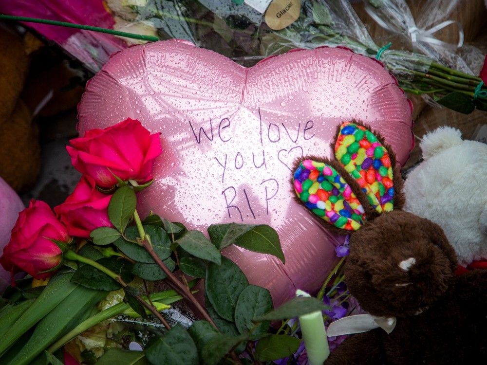 People gathered in Palmadeo Park on the weekend, near the home of the biggest mass killing in Ottawa's recent history, for a vigil in honour of the victims.