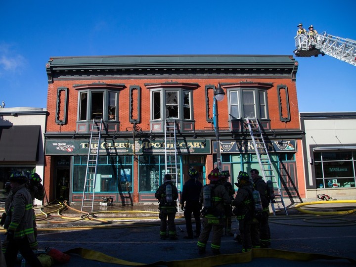  Ottawa firefighters and first responders had a section of Bank Street closed to extinguish a fire at the The Glebe Apothecary, Sunday, March 24, 2024.
