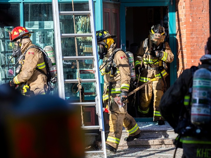  Ottawa firefighters and first responders had a section of Bank Street closed to extinguish a fire at the The Glebe Apothecary, Sunday, March 24, 2024.