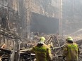 Rescuers inside the collapsed concert hall