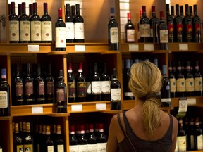 Woman browses bottles in LCBO