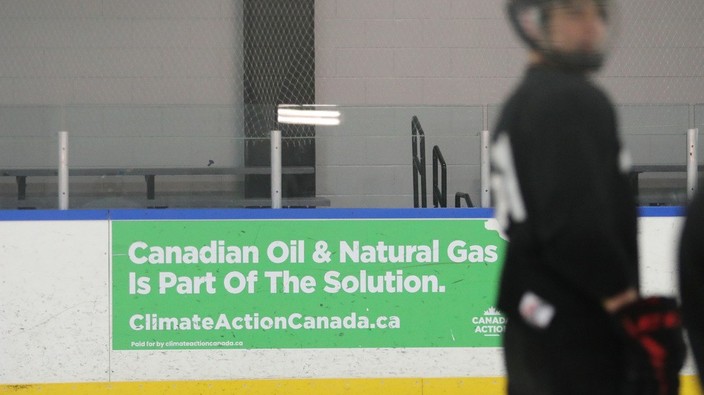 Ottawa pressed to ban fossil fuel ads on OC Transpo and rink boards
