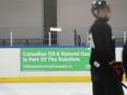 A recent advertisement for the oil industry is shown at the Brewer Ice Arena in Ottawa