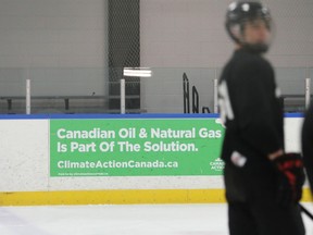 A recent advertisement for the oil industry is shown at the Brewer Ice Arena in Ottawa
