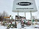 A file photo shows a memorial to the killed and injured workers on the day after the explosion at Eastway Tank in January 2022.