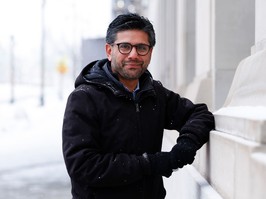 Centre MP Yasir Naqvi, on Wellington Street in 2023