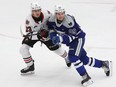 Nathan Villeneuve, right, of the Sudbury Wolves, and Ryan Vannetten, of the Niagara IceDogs, battle for position during OHL action at the Sudbury Community Arena in Sudbury, Ont. on Friday February 9, 2024. John Lappa/Sudbury Star/Postmedia Network