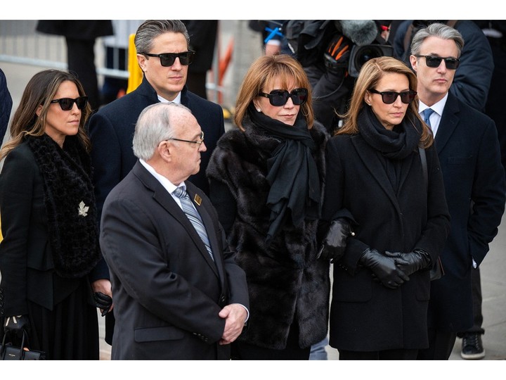  Mila Mulroney (C), widow of the late Brian Mulroney, and daughter Caroline Mulroney (2nd R), watch the arrival of the late former Canadian Prime Minister Brian Mulroney to lie-in-state at the Sir John A. Macdonald Building in Ottawa, Canada, on March 19, 2024.