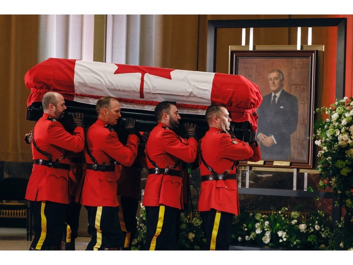 Pallbearers carry the casket of former Canadian Prime Minister Brian Mulroney at the Sir John A. Macdonald Building where he will lie-in-state in Ottawa, Canada, on March 19, 2024.