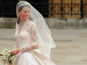 In this file picture taken on April 29, 2011 Kate Middleton smiles as she arrives at the West Door of Westminster Abbey in London for her wedding to Britain's Prince William.