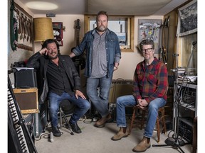 Musicians Paul Langlois, Josh Finlayson and Andy Maize pictured in a home studio