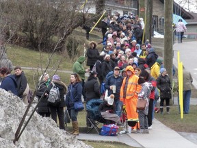 Hundreds of people line up along Montreal Street in Kingston last Wednesday in hopes of getting a family doctor.
