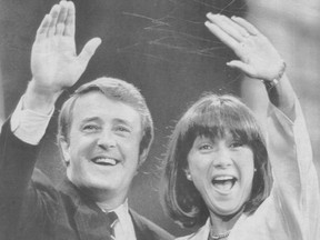 BAIE COMEAU — Then-Tory Leader Brian Mulroney and his wife Mila respond to cheers as they appear at their election headquarters following their electoral victory in 1984.