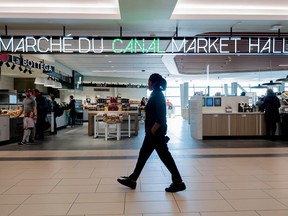OTTAWA: A person walks past the Canal Market Hall at the Ottawa Macdonald–Cartier International Airport Canada/International gate in Ottawa, on Monday, Feb. 26, 2024.