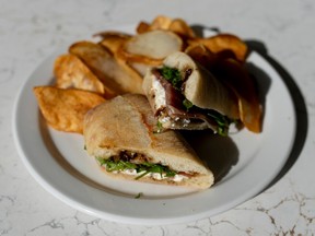 OTTAWA: A Panini with potato chips from the Canal Market Hall at the Ottawa Macdonald–Cartier International Airport Canada/International gate in Ottawa, on Monday, Feb. 26, 2024.