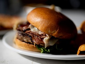 OTTAWA: A burger from the Canal Market Hall at the Ottawa Macdonald–Cartier International Airport Canada/International gate in Ottawa, on Monday, Feb. 26, 2024.