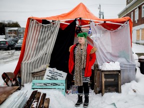 Eloe (no last name given) poses is shown outside her tent in Gatineau in January