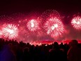 Almost a year after smog from wildfires led officials in Montreal to cancel two major fireworks shows, fireworks industry associations have released a study that concludes the displays have only a small effect on air quality. People look on as fireworks explode over Montreal's old port during New Year's Eve celebrations in Montreal, Monday, Jan. 1, 2018.